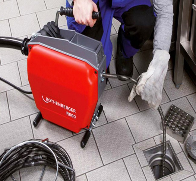 Máy lò xo để thông cống tắc nghẹt